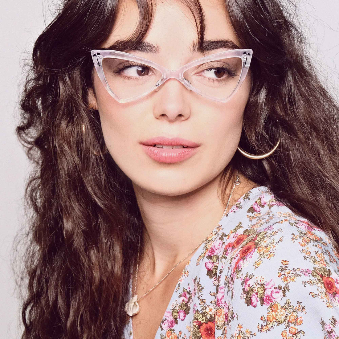 Model wearing small cat eye glasses