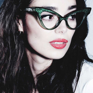 Model wearing green cat eye glasses