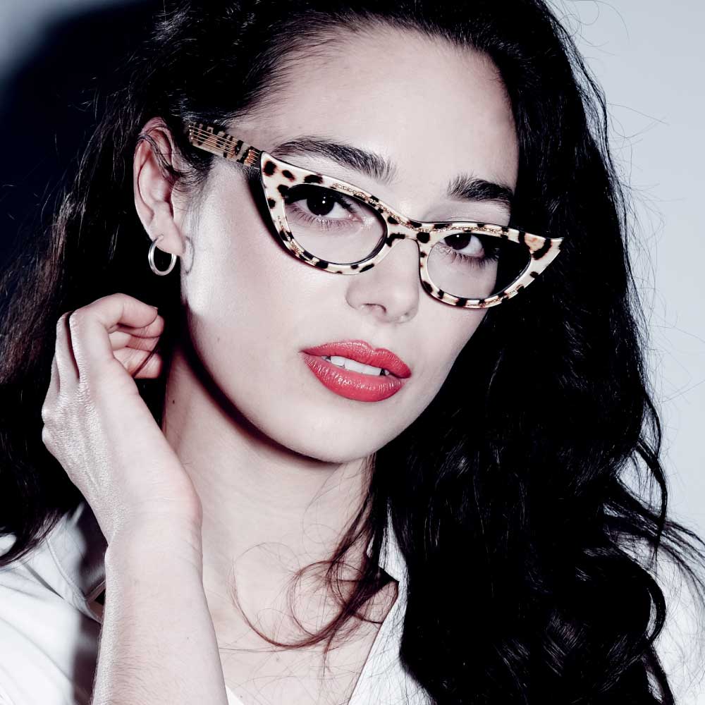 Model wearing bold leopard print cat eye glasses